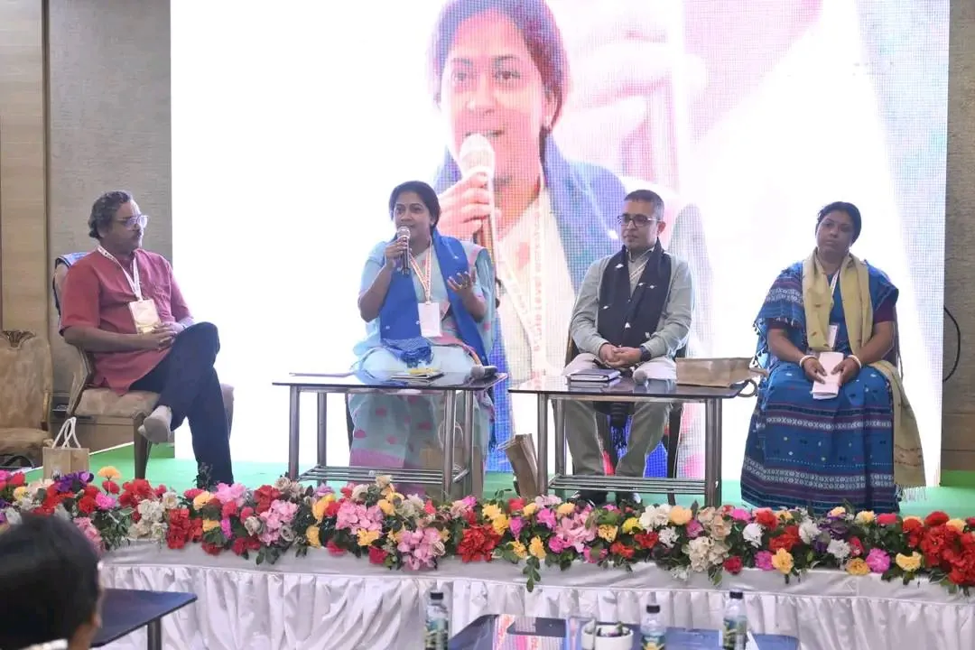 Full panel seated on stage at the State Level Workshop on Transforming Early Learning