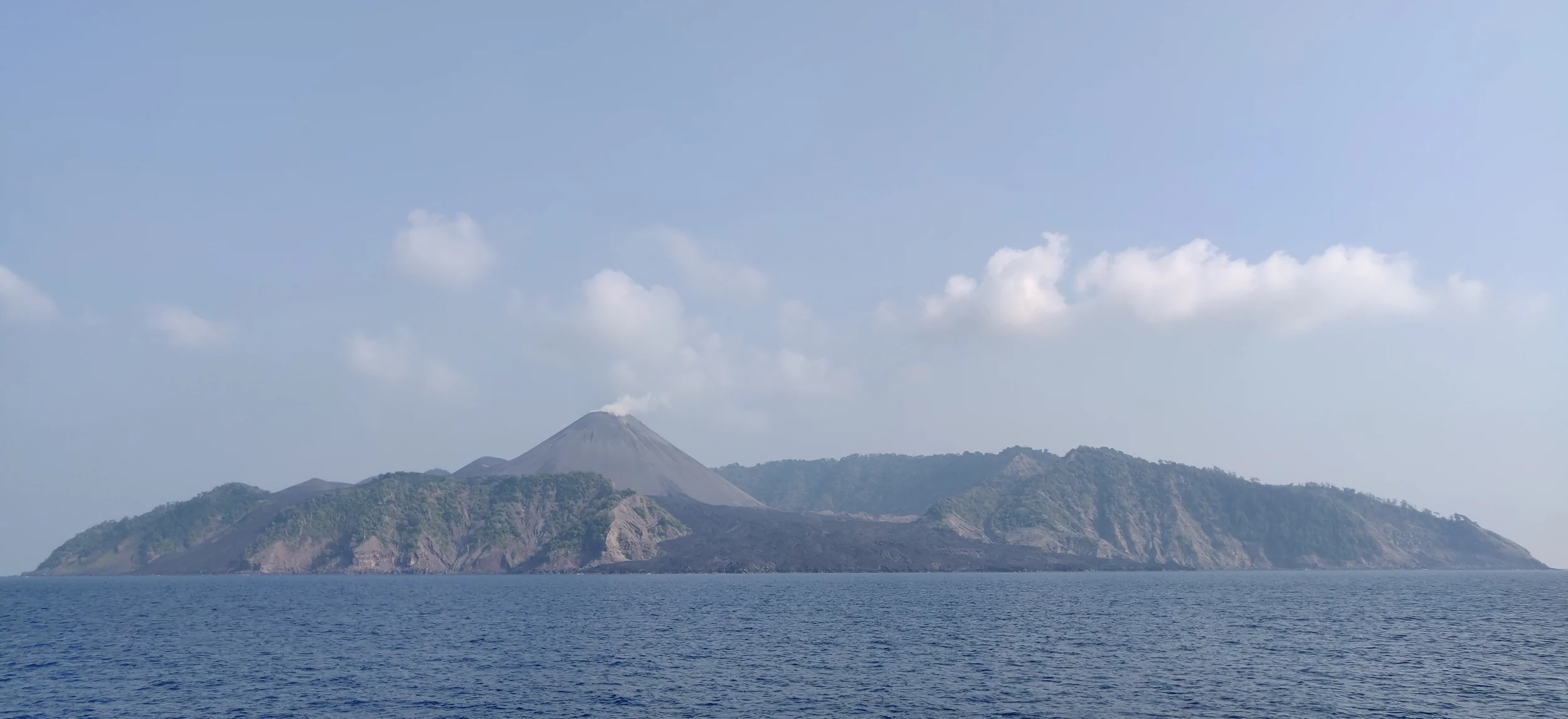 The volcanic cone of Barren Island rising from the sea in the Andamans